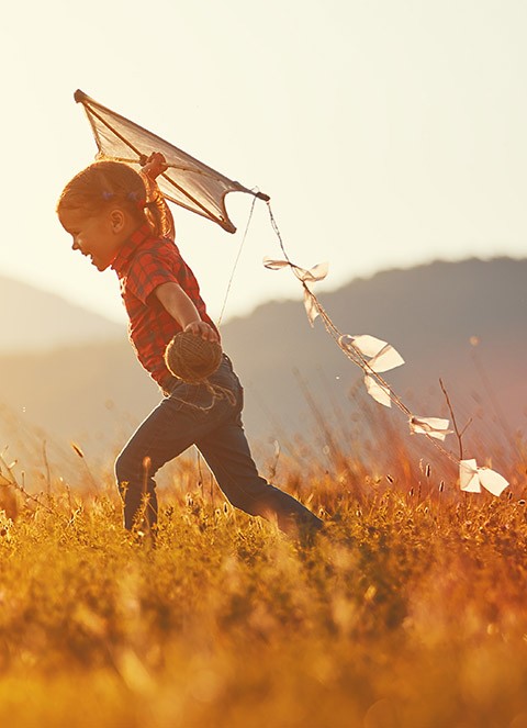 Child Flying a Kite